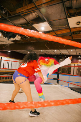 two lucha wrestlers fighting