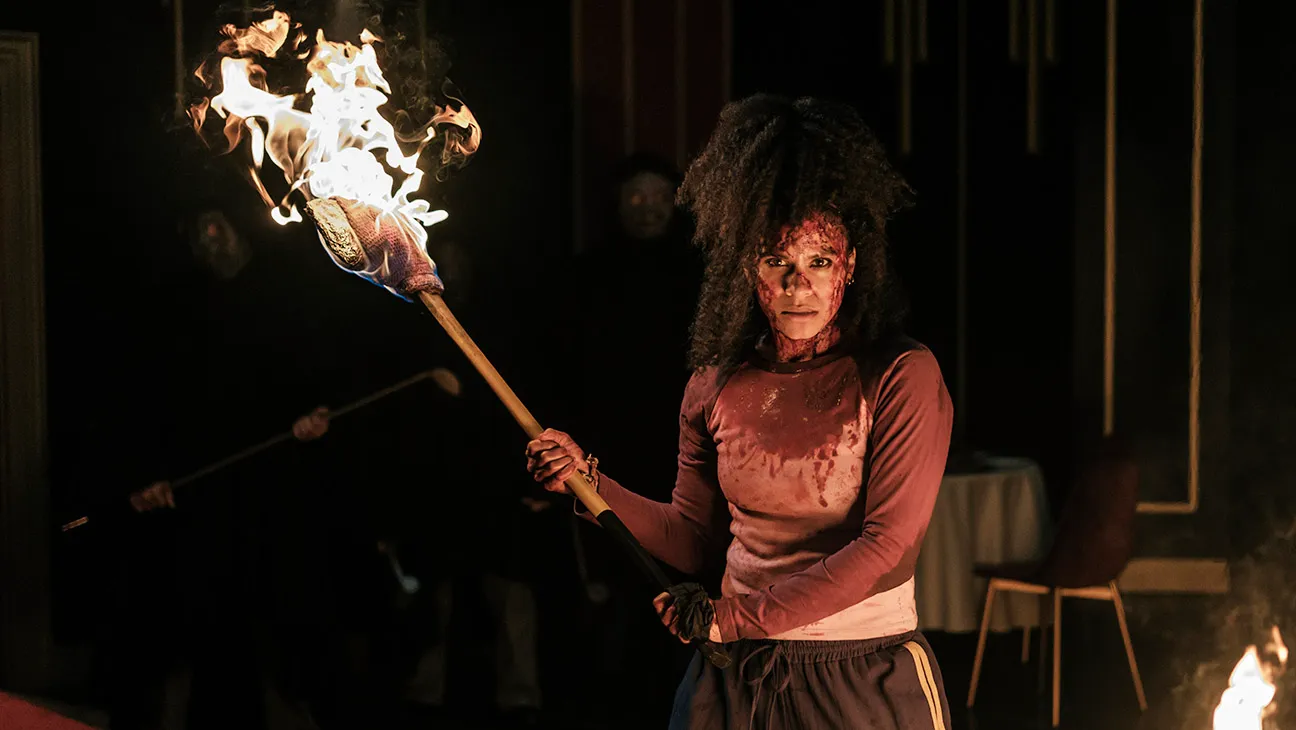 Woman with flaming axe.